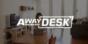 Woman working at her table with the away from my desk logo on top of it