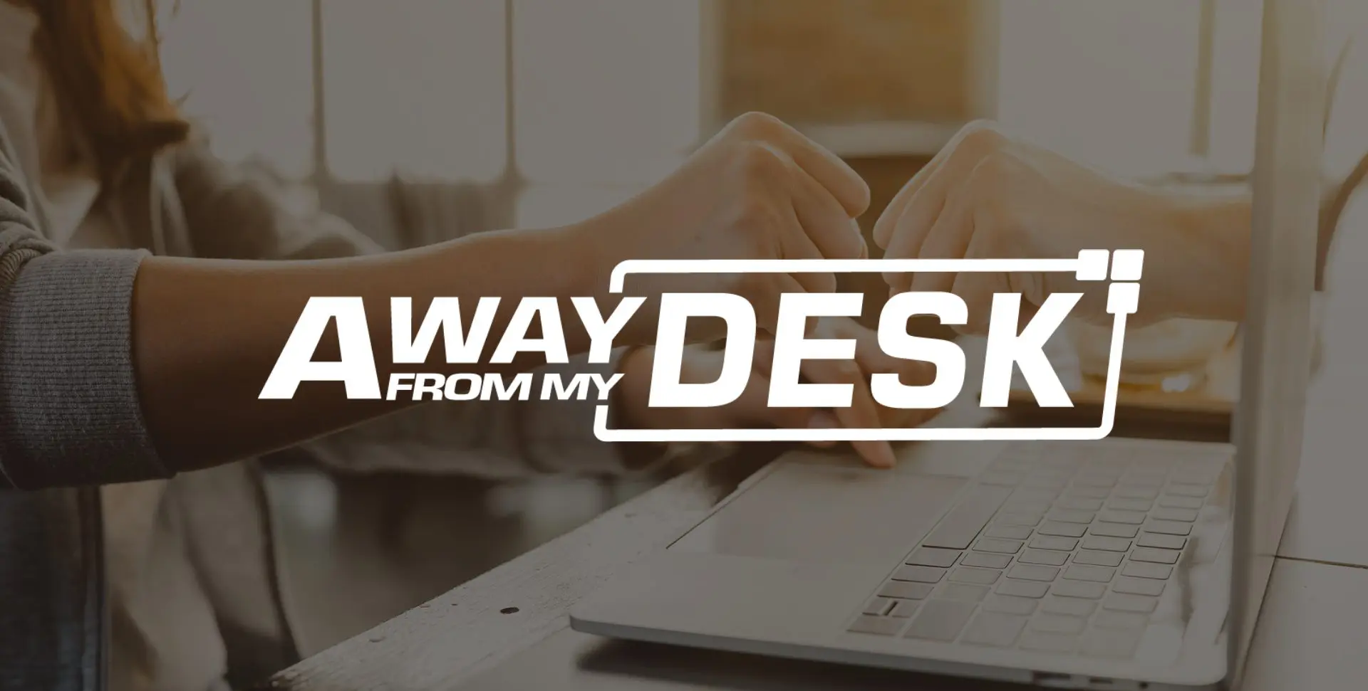 Woman clicking her mouse, with the other wrist clenching with the away from my desk logo on top of it