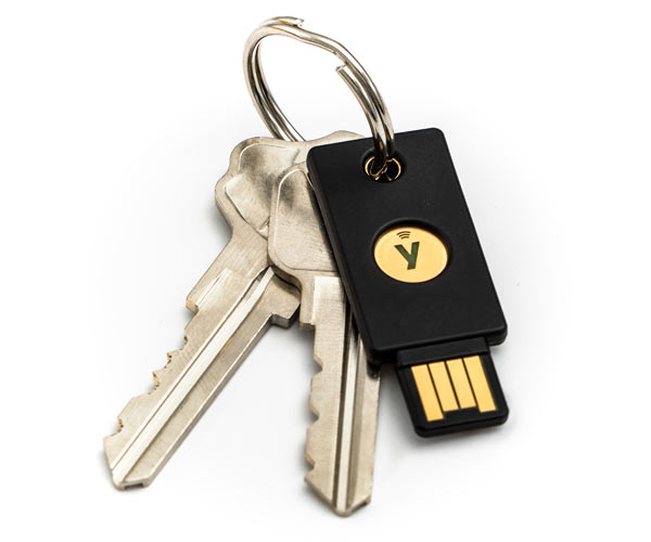 image showing a YubiKey 5nfc token on a keyring with other keys