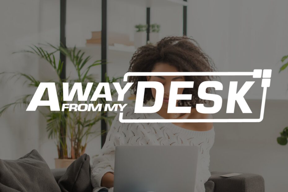 Woman on her laptop with the away from my desk logo on top of it