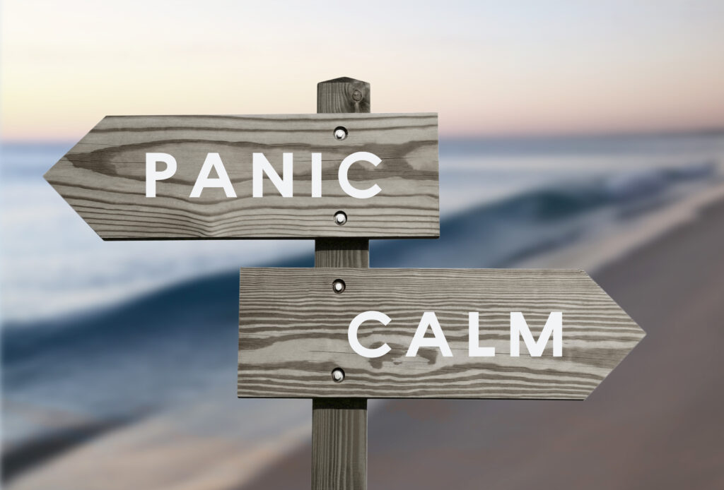 Infographic of Calm vs Panic - wooden sign facing left with panic on and wooden sign facing right with calm on it